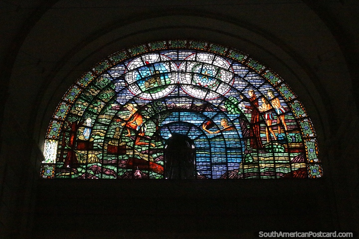 Arched stained glass window at the cathedral in Caacupe. Photo