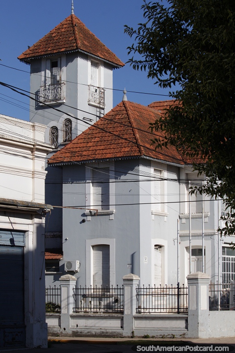Salvarredy House, landmark building with tower and tiled roof in Chajari. (480x720px). Argentina, South America.