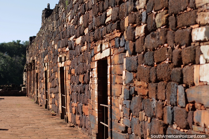 Wall made of stone bricks with doors running along it at the Jesuit Missions in San Ignacio. (720x480px). Argentina, South America.