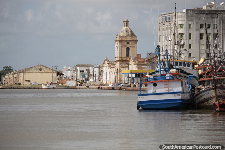 Looking across the waters of the lake to the museum tower in Rio Grande. (720x480px). Brazil, South America.