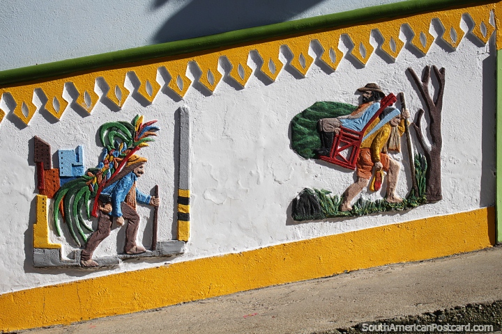 Finely crafted skirting decorations in Guatape of men working. (720x480px). Colombia, South America.