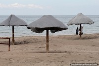 Umbrellas on the beach in Puerto Madryn, waiting for the people to arrive.