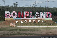 Large pink letters spell out Bonpland on the city outskirts.