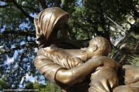 Woman feeds her baby, bronze work at Plaza Getulio Vargas in Santa Cruz do Sul.