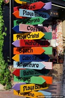 Larger version of Santa Marta has beaches, adventure, coffee, hiking and more, a colorful sign.