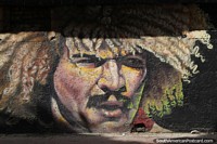 Larger version of Carlos Valderrama played 111 international soccer games for his country, street mural in Santa Marta.