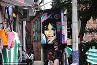Cautivadora obra de arte de una mujer en la calle de la Comuna 13, Medelln. Colombia, Sudamerica.