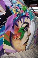 Increble arte callejero en una escalera de la Comuna 13, cara, fruta y paisaje urbano, Medelln. Colombia, Sudamerica.