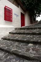 Cobblestone stairway and street with nice facades in the historic center of Honda.