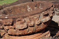 Heavy stone urn, the Baptismal font of the Guarani Jesuits of Trinidad.